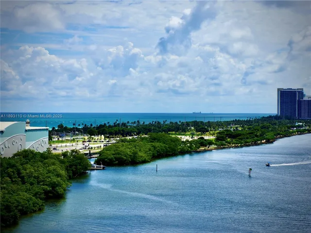 a view of a garden with a lake