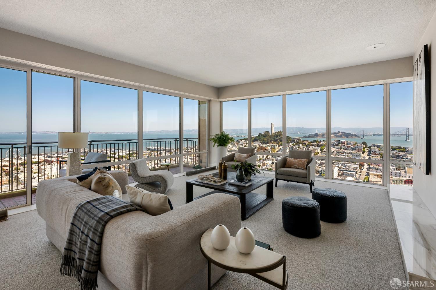 a very nice looking living room with furniture and a large window