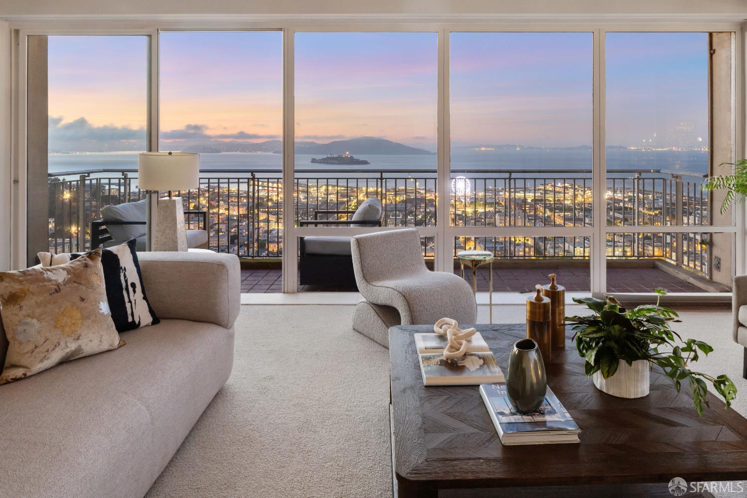 1750 Taylor Street, Unit 1001 San Francisco, CA 94133 - Photo 11 of 43 a living room with furniture and large windows