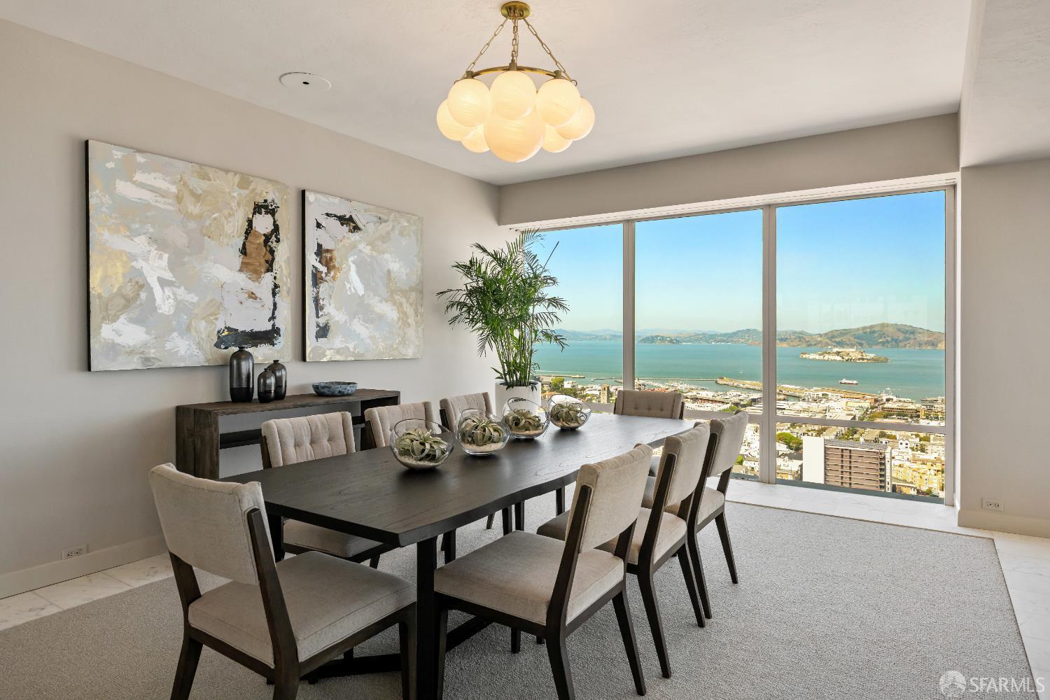 1750 Taylor Street, Unit 1001 San Francisco, CA 94133 - Photo 13 of 43 a view of a dining room with furniture window and outside view