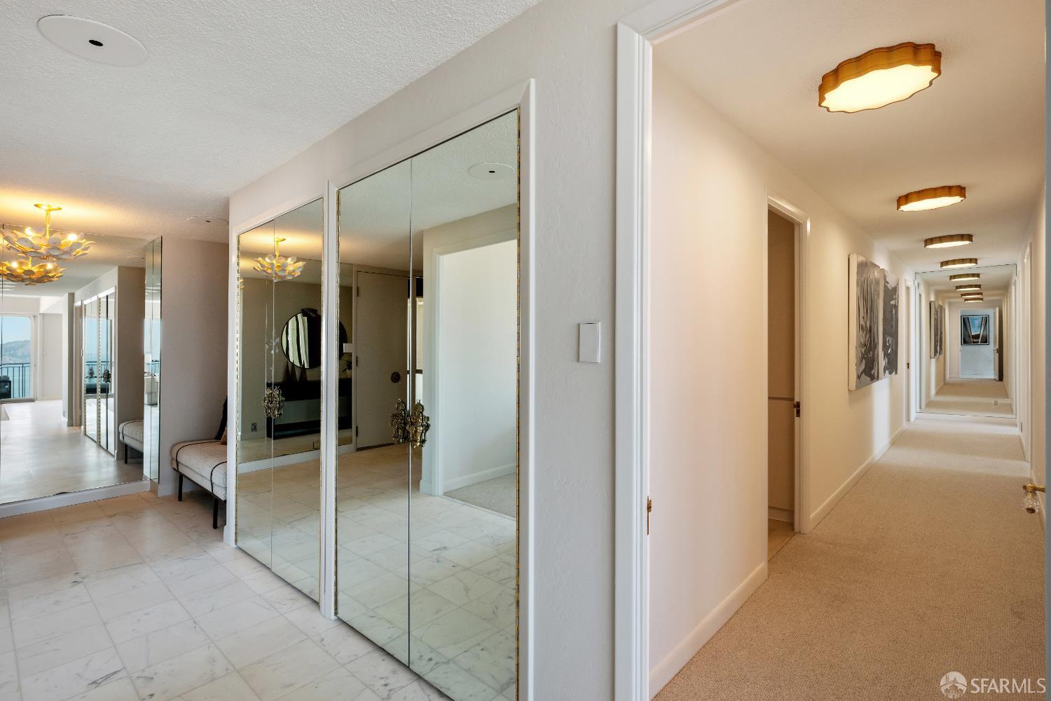 1750 Taylor Street, Unit 1001 San Francisco, CA 94133 - Photo 17 of 43 a view of a hallway with wooden shelves