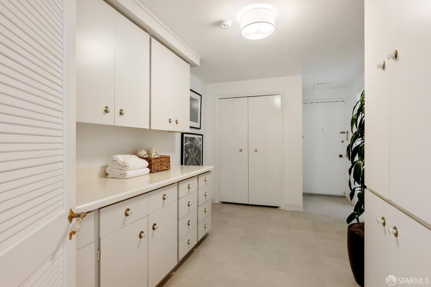1750 Taylor Street, Unit 1001 San Francisco, CA 94133 - Photo 27 of 43 a view of cabinets and wooden floor