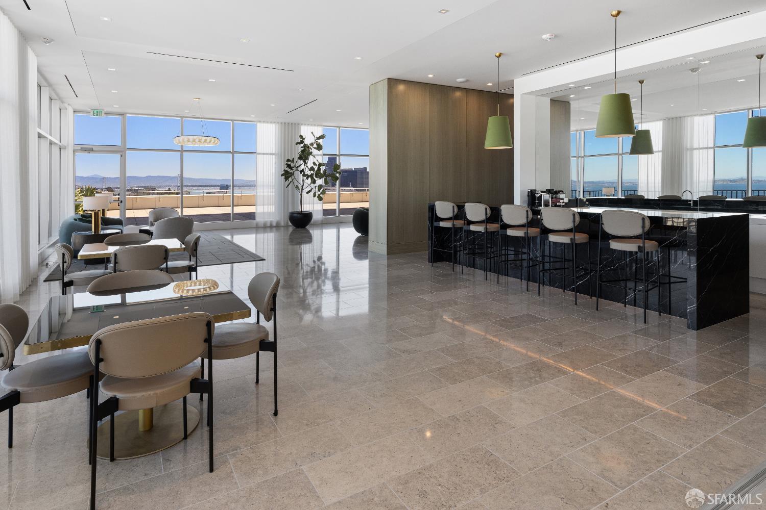 1750 Taylor Street, Unit 1001 San Francisco, CA 94133 - Photo 32 of 43 a large kitchen with a table and chairs