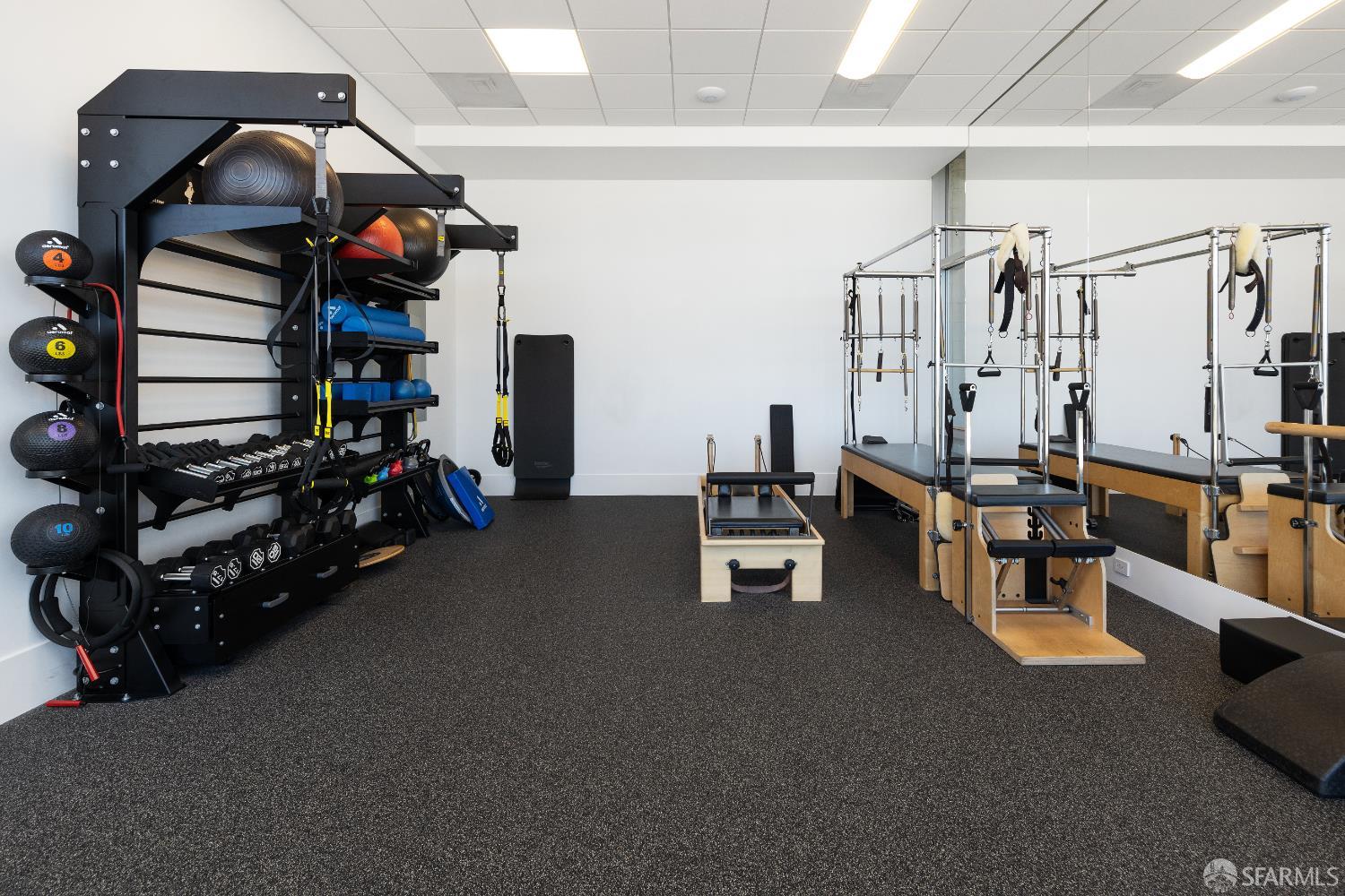 1750 Taylor Street, Unit 1001 San Francisco, CA 94133 - Photo 38 of 43 a living room with furniture and a flat screen tv