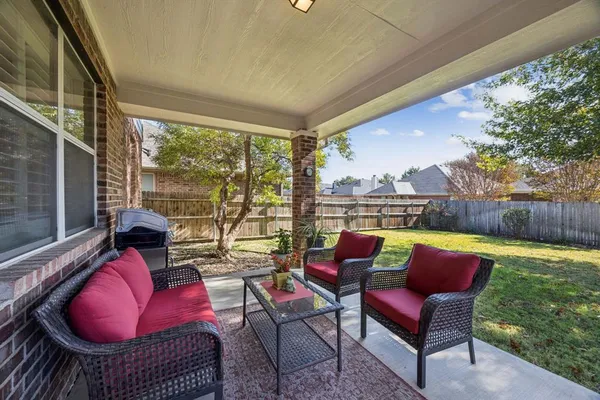 a balcony with outdoor seating and outdoor space