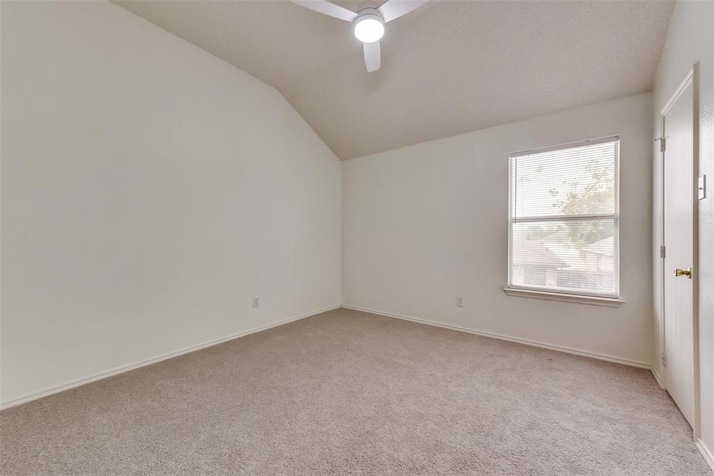 13401 Ponderosa Ranch Road Fort Worth, TX 76262 - Photo 15 of 22 an empty room with a window