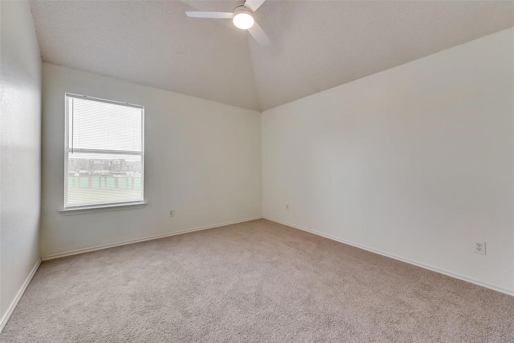 13401 Ponderosa Ranch Road Fort Worth, TX 76262 - Photo 17 of 22 an empty room with a window