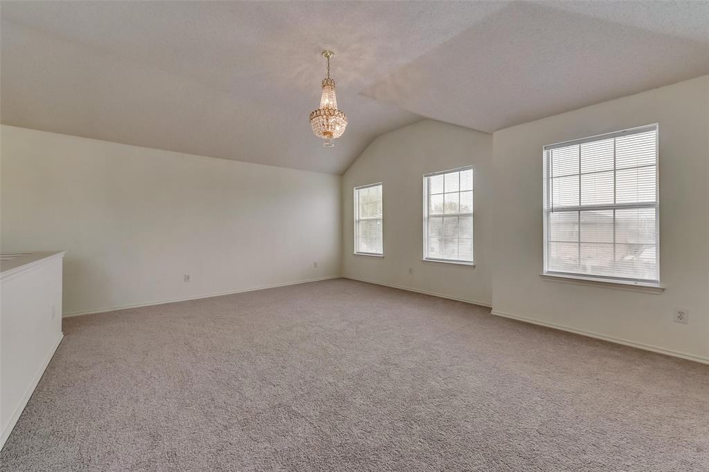 13401 Ponderosa Ranch Road Fort Worth, TX 76262 - Photo 19 of 22 an empty room with windows