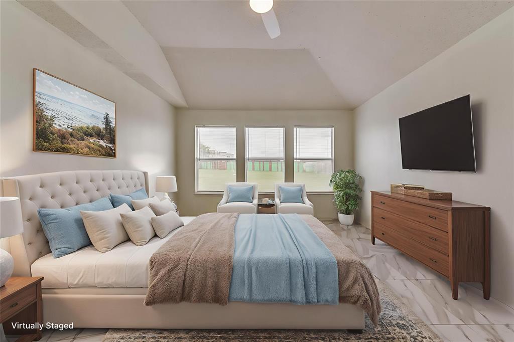 13401 Ponderosa Ranch Road Fort Worth, TX 76262 - Photo 3 of 22 a bed room with a bed a television and a large window