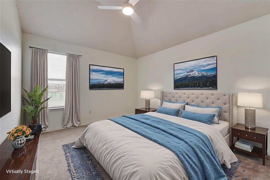 13401 Ponderosa Ranch Road Fort Worth, TX 76262 - Photo 7 of 22 a bedroom with a bed and a potted plant