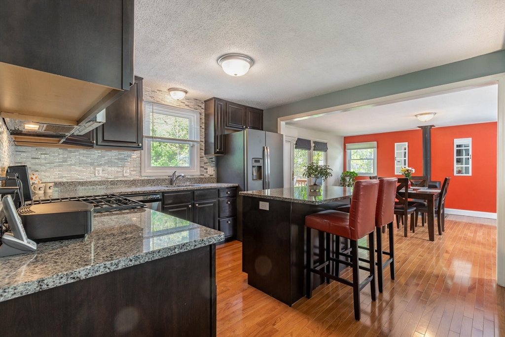70 Parham Road Tyngsboro, MA 01879 - Photo 11 of 40 a kitchen with sink a counter top space and appliances