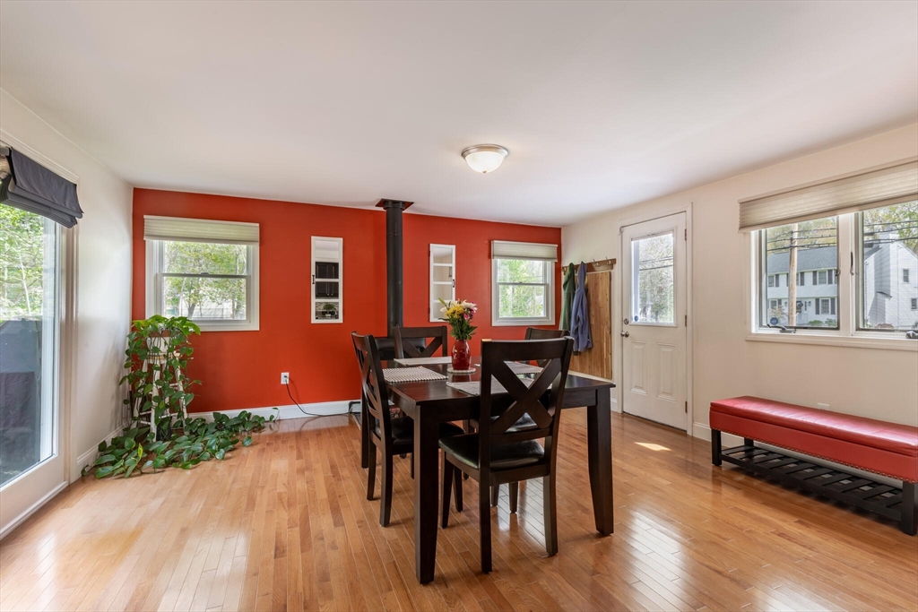 70 Parham Road Tyngsboro, MA 01879 - Photo 18 of 40 a view of a dining room with furniture and wooden floor