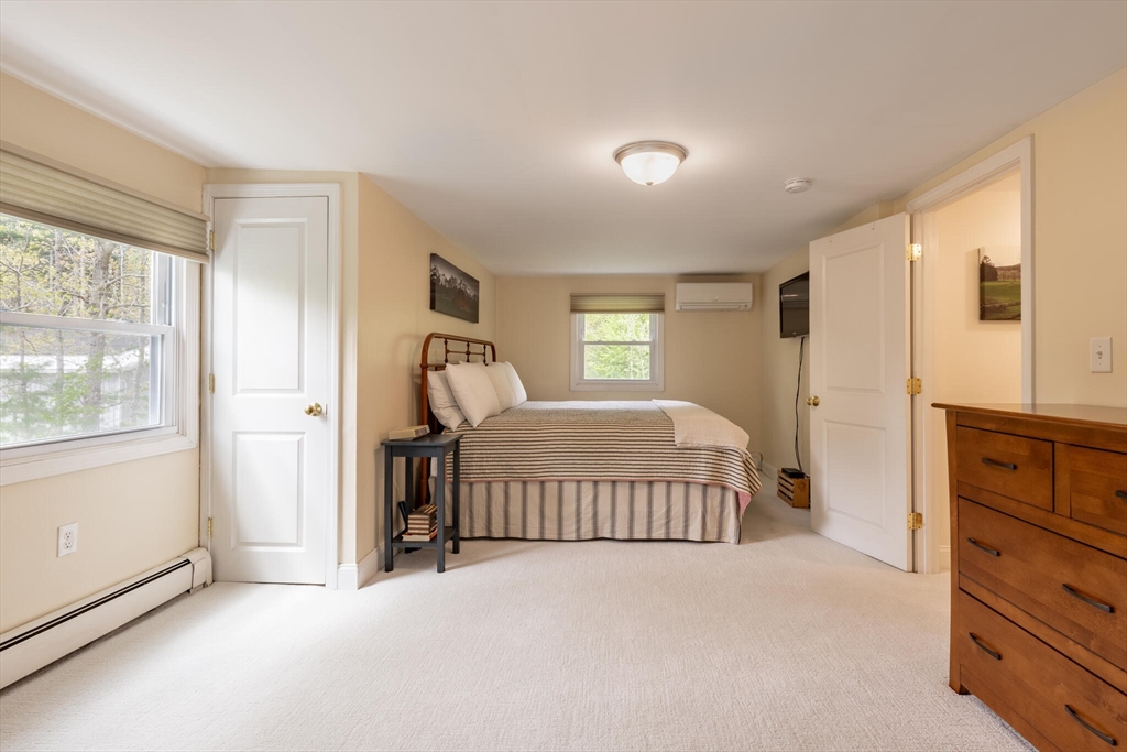 70 Parham Road Tyngsboro, MA 01879 - Photo 26 of 40 a bedroom with a bed and a window