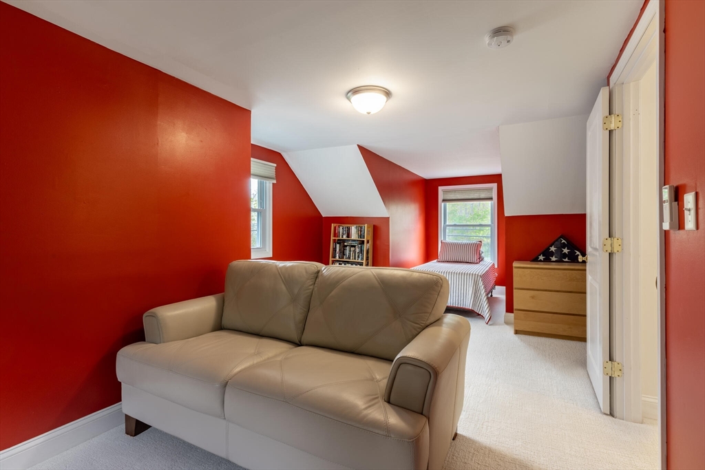 70 Parham Road Tyngsboro, MA 01879 - Photo 29 of 40 a living room with furniture and a window