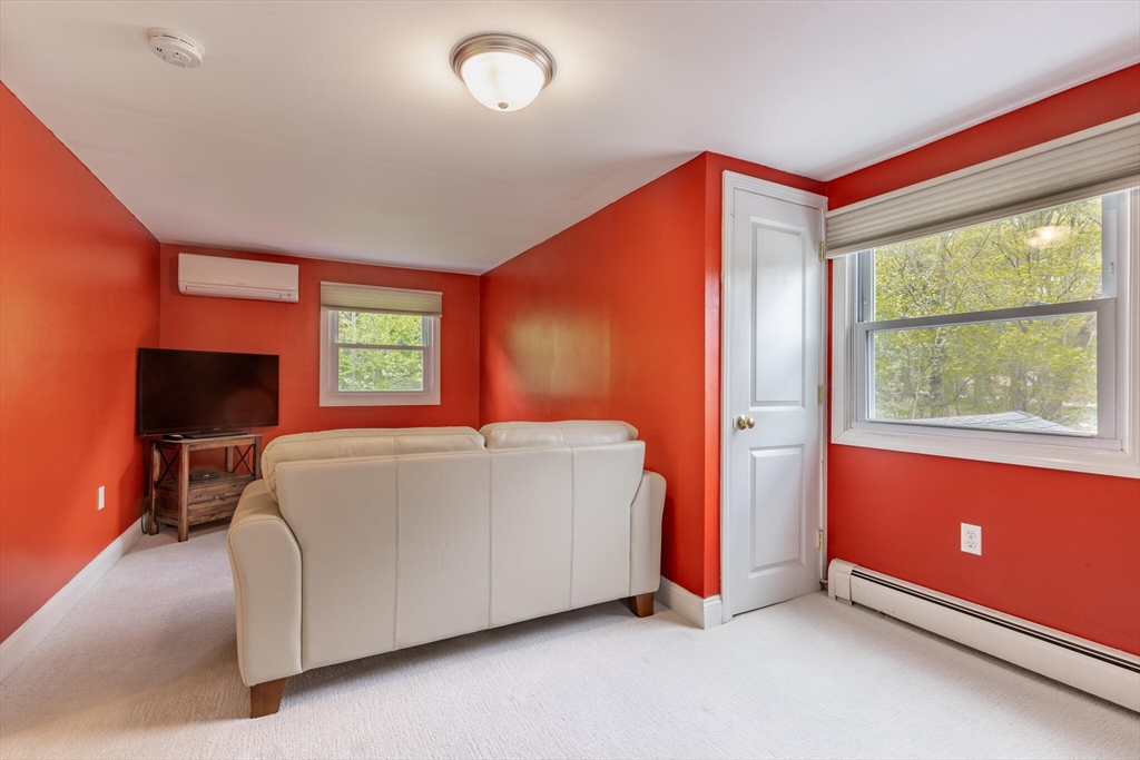 70 Parham Road Tyngsboro, MA 01879 - Photo 31 of 40 a bed room with a bed and a window