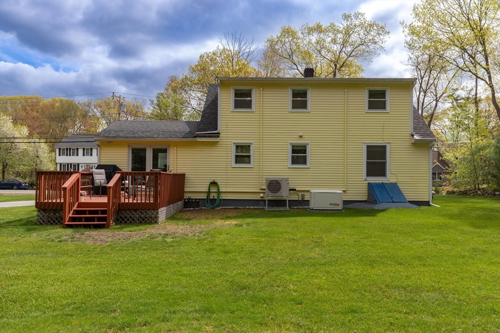 70 Parham Road Tyngsboro, MA 01879 - Photo 38 of 40 a view of a house with patio