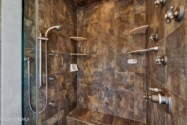 a view of a room with wooden floor and stairs