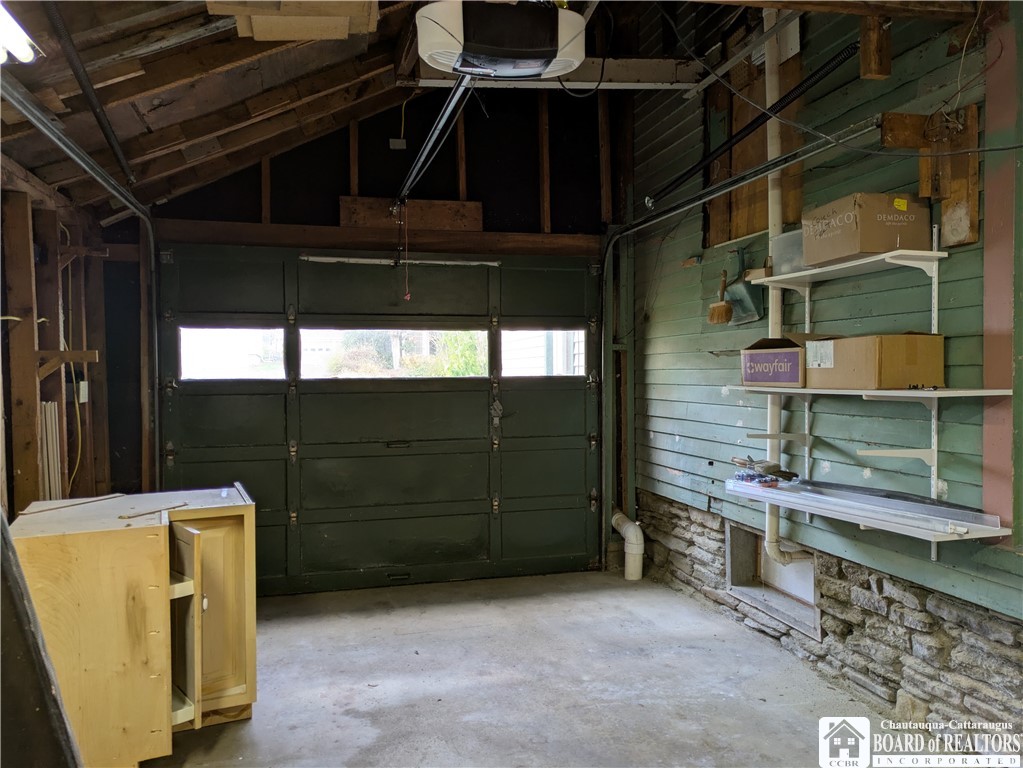 33 Maple Street Ellery, NY 14712 - Photo 33 of 40 Attached garage with extra storage room and a new