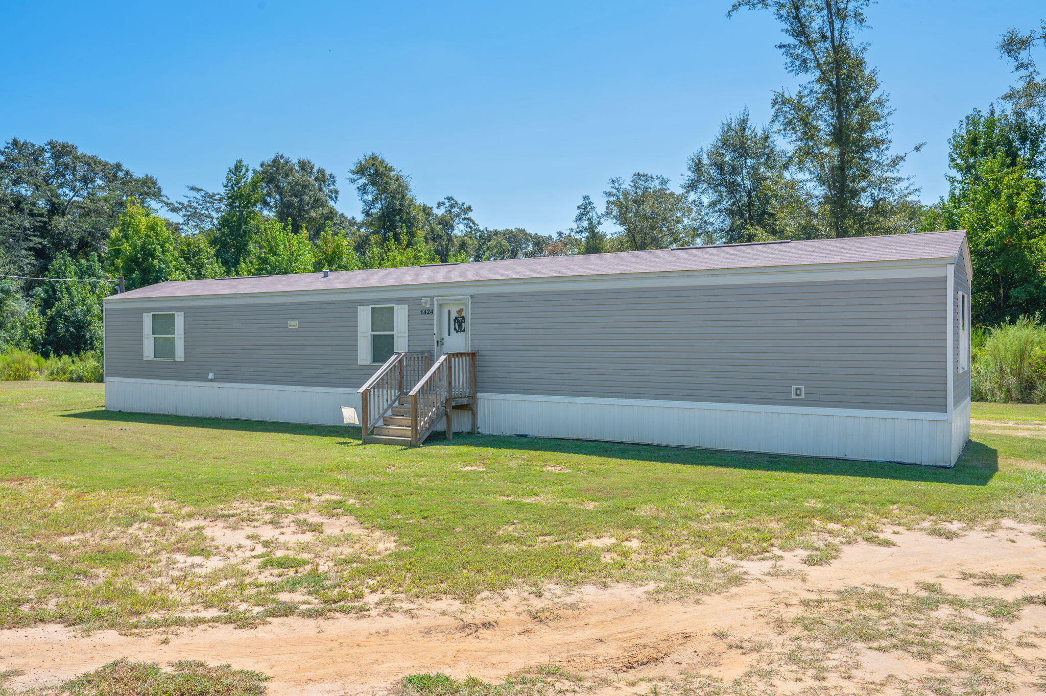 1424 East F Sanford Road Baker, FL 32531 - Photo 25 of 32 a view of a swimming pool with an outdoor space