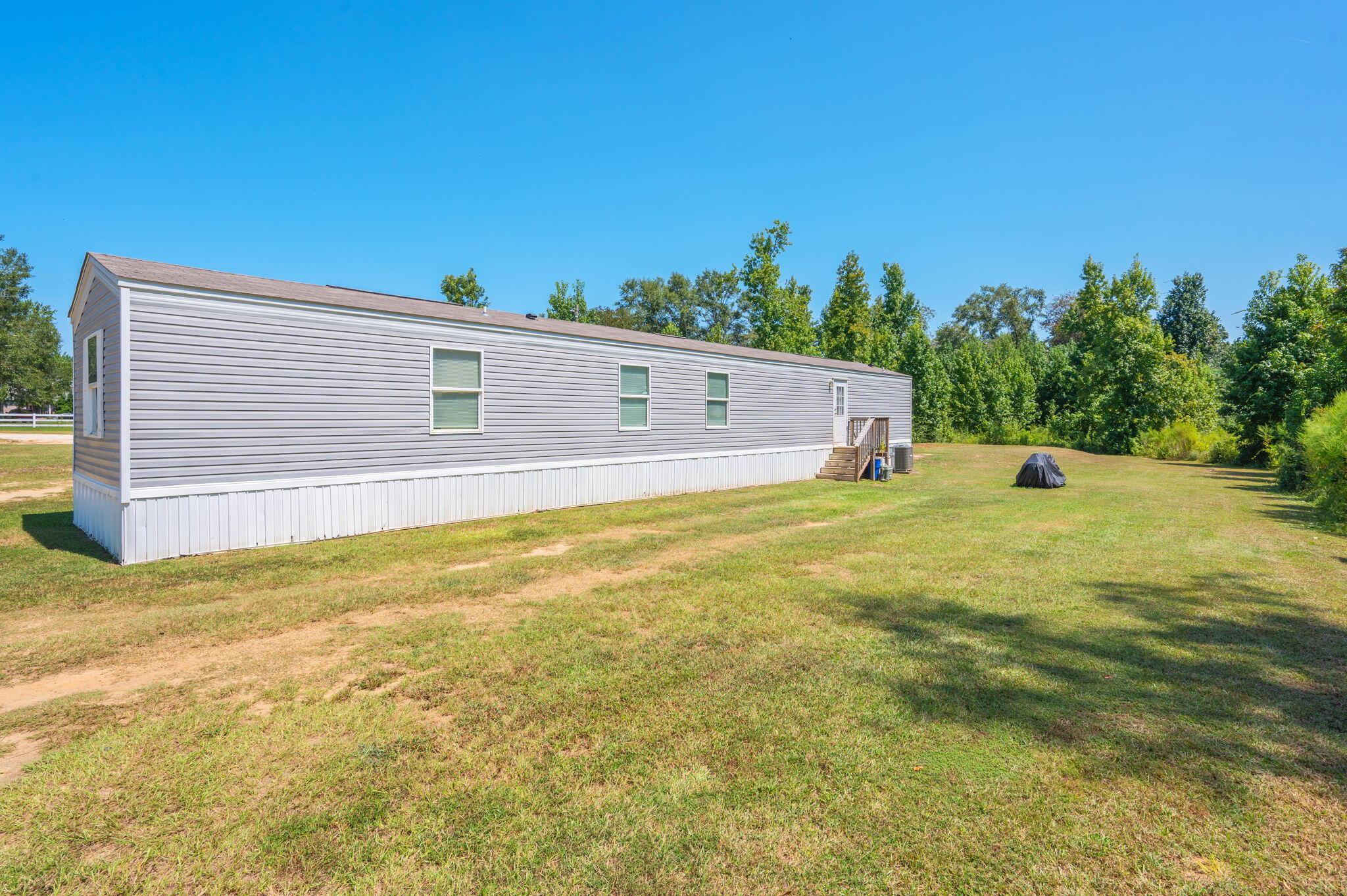 1424 East F Sanford Road Baker, FL 32531 - Photo 29 of 32 a view of a yard with an outdoor space