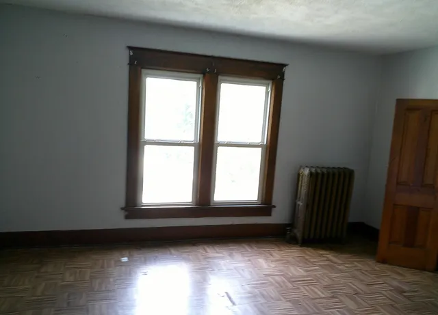 an empty room with windows