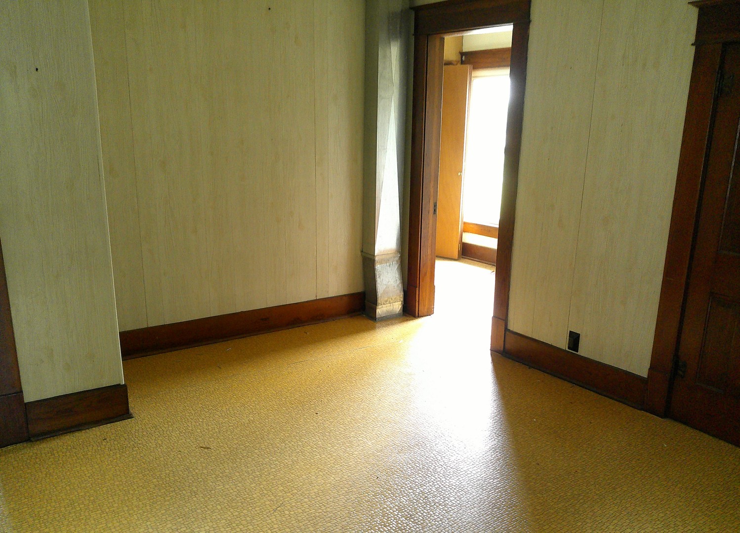 208 East State Street Fairmount, IL 61841 - Photo 17 of 21 a view of a room with wooden floor and a window