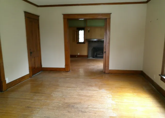 a view of a room with a fireplace