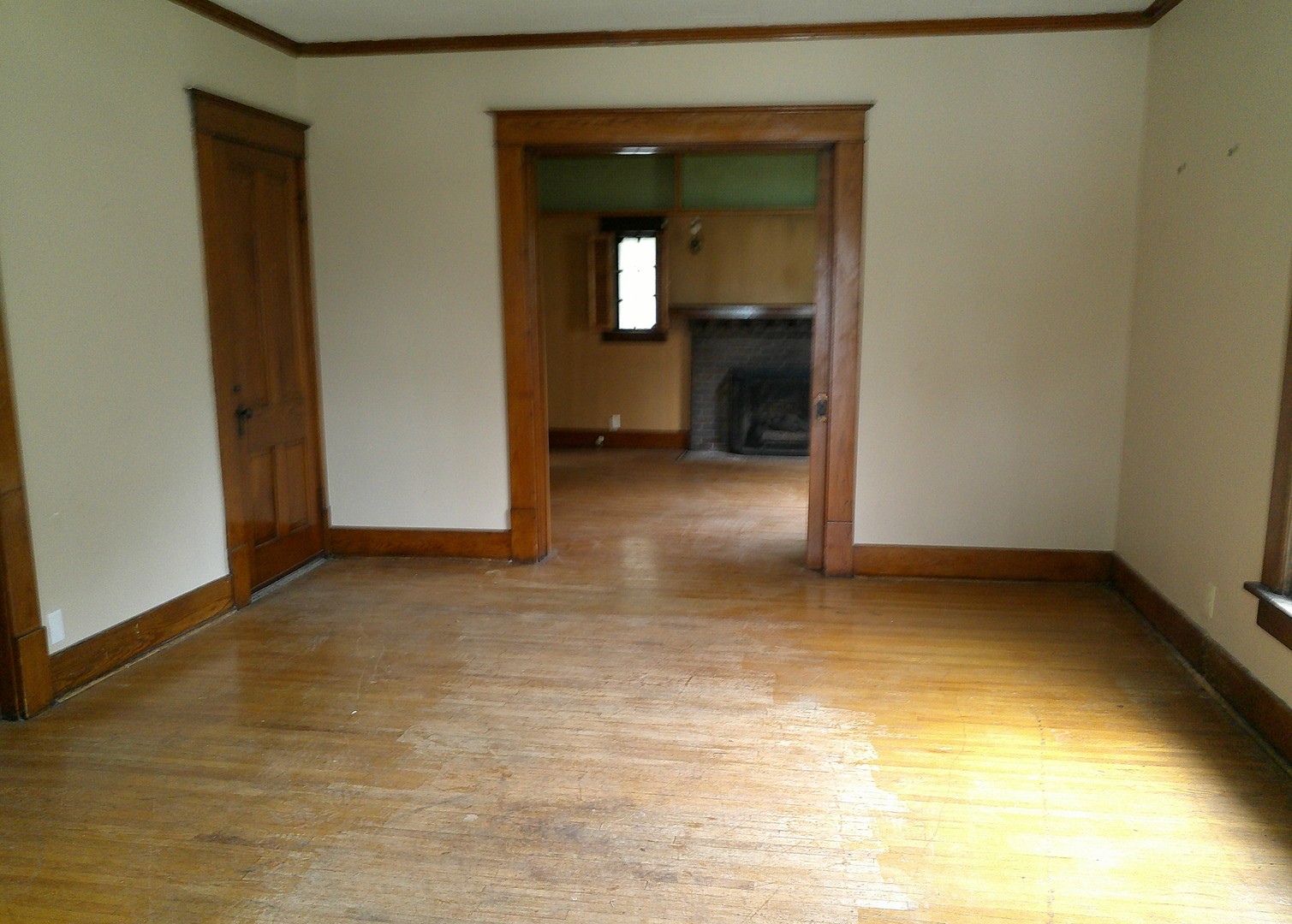 208 East State Street Fairmount, IL 61841 - Photo 4 of 21 a view of a room with a fireplace