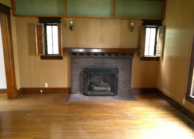 a living room with a fireplace