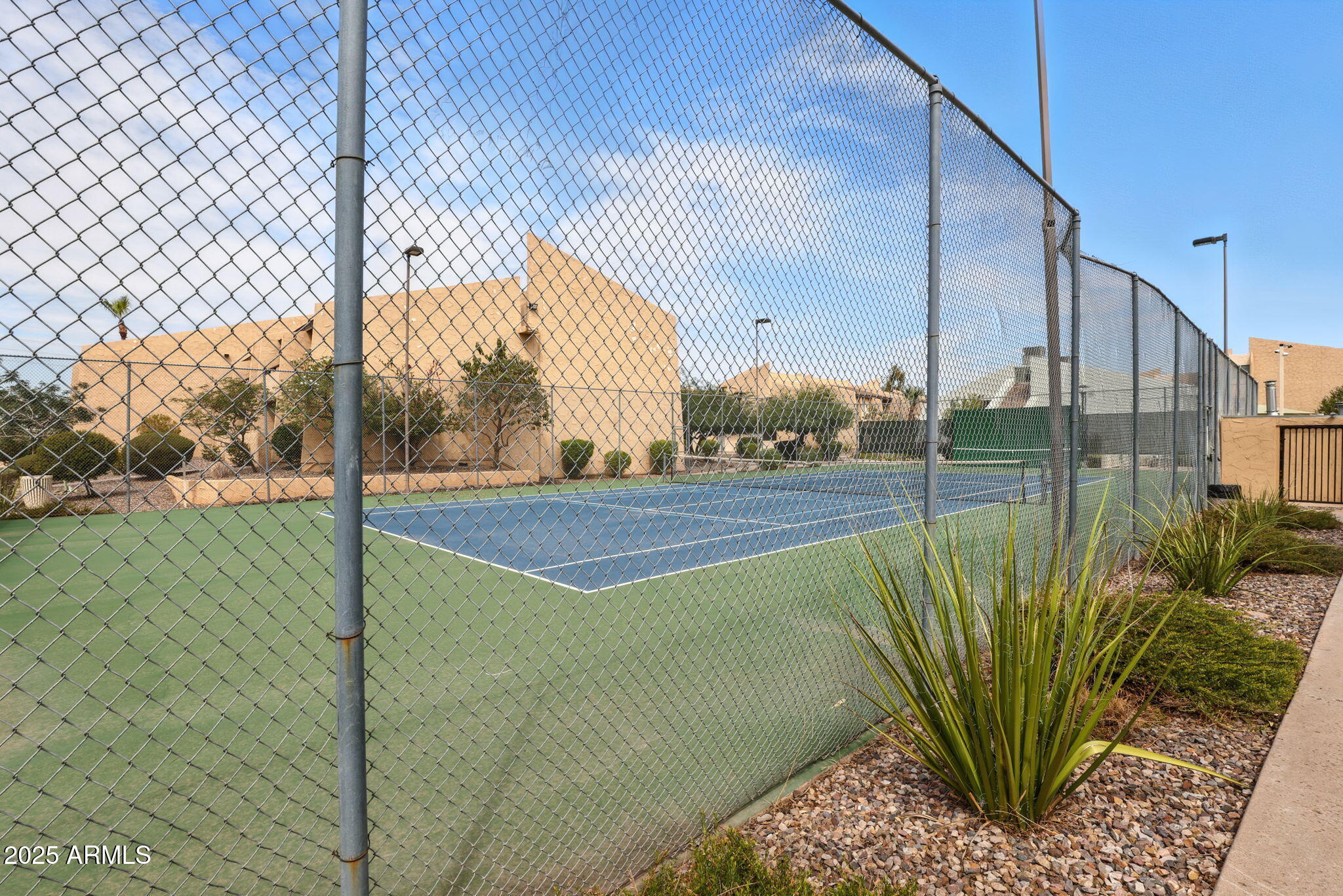 8055 East Thomas Road, Unit N201 Scottsdale, AZ 85251 - Photo 3 of 28 a view of a garden