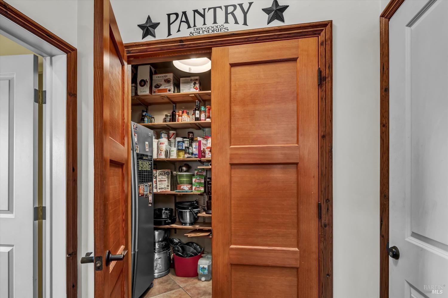 5963 Eickhoff Road Lakeport, CA 95453 - Photo 17 of 51 a view of walk in closet with clothes and shoes