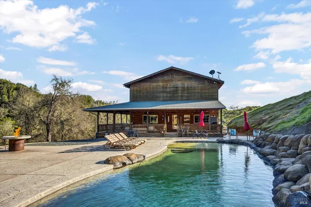 a view of porch with green space