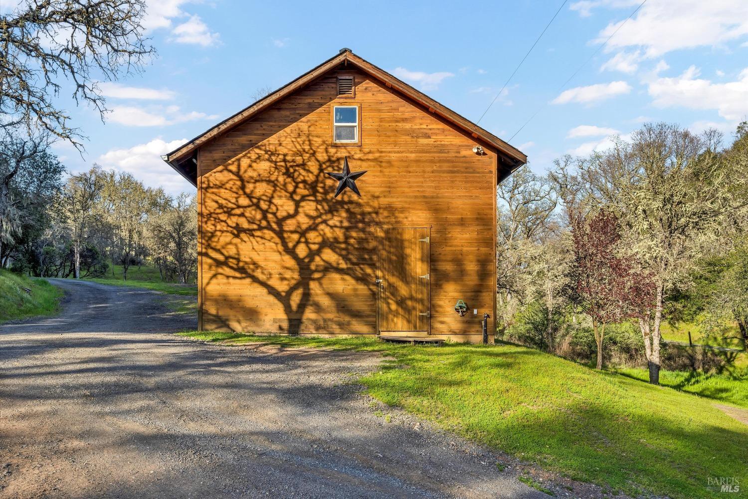 5963 Eickhoff Road Lakeport, CA 95453 - Photo 7 of 51 a view of backyard of house with green space