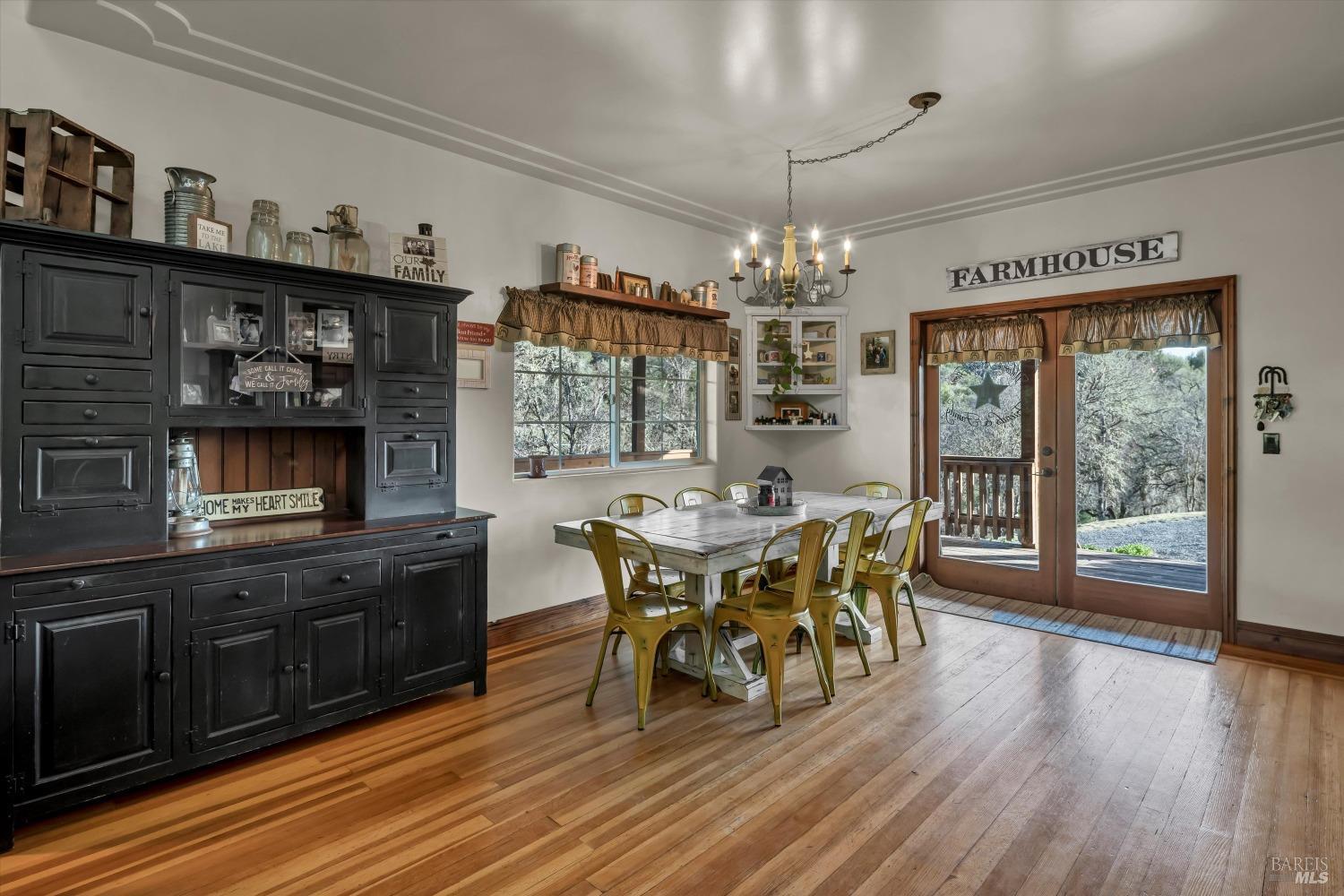 5963 Eickhoff Road Lakeport, CA 95453 - Photo 10 of 51 a view of a dining room with furniture wooden floor and chandelier