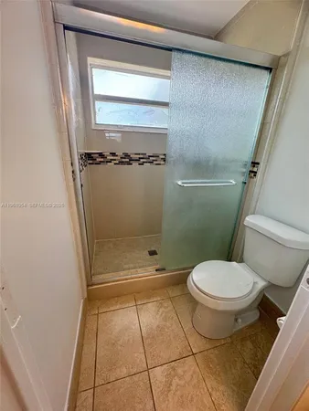 a spacious bathroom with a sink vanity and a mirror