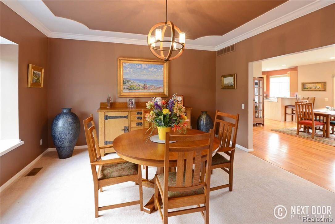 4886 Pleasant Valley Road Brighton, MI 48114 - Photo 6 of 51 Formal dining, look at that gorgeous ceiling detail.