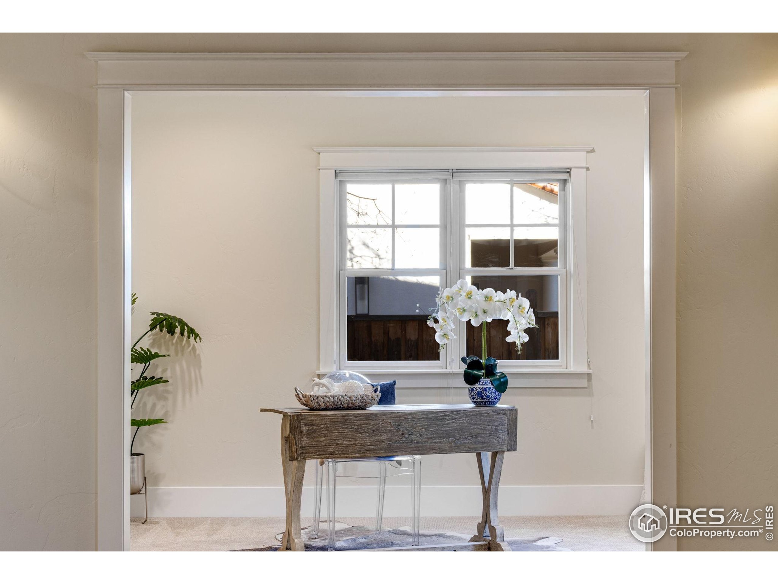 707 South Fillmore Street Denver, CO 80209 - Photo 15 of 49 a living room with furniture and floor to ceiling window