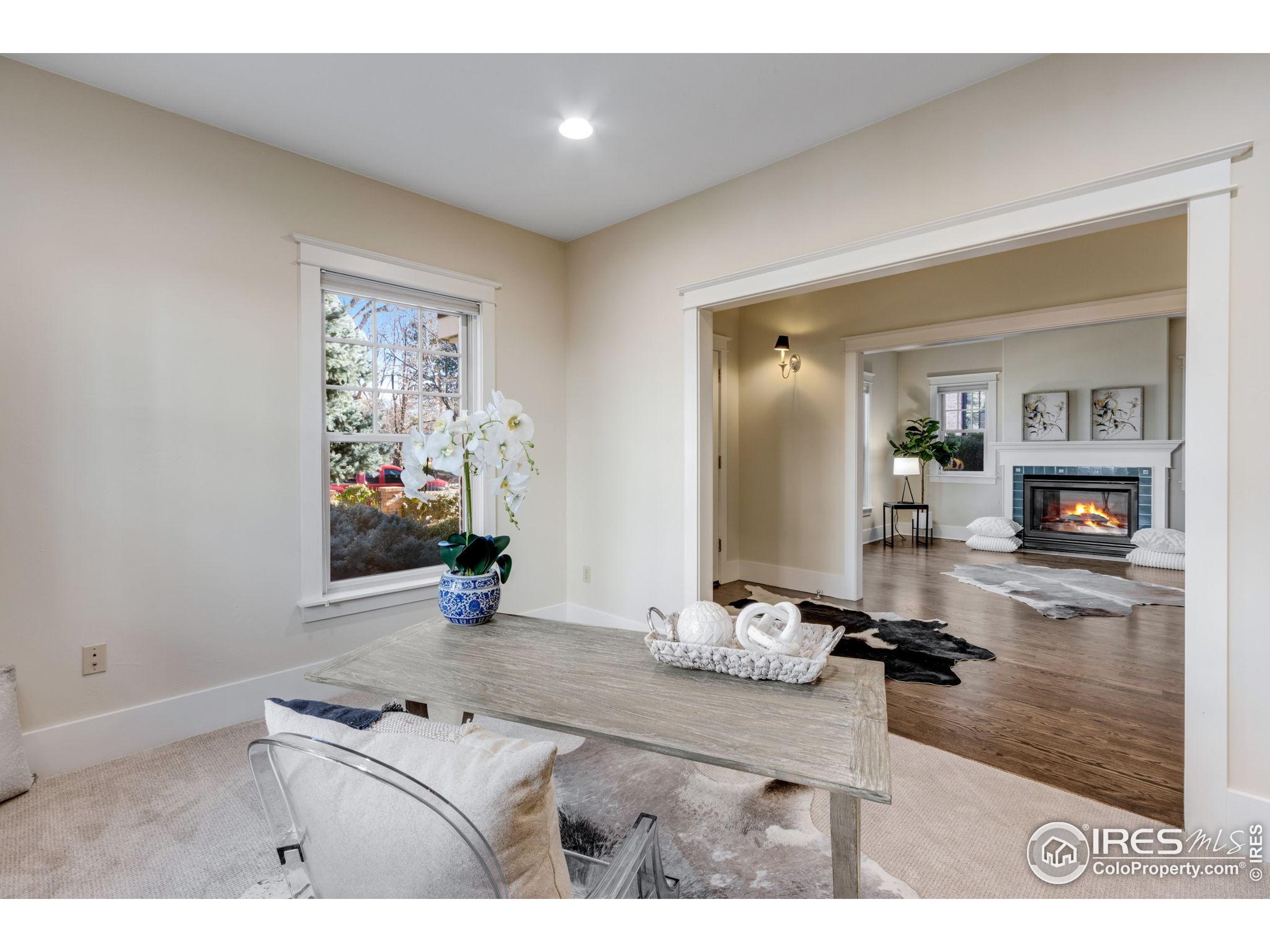707 South Fillmore Street Denver, CO 80209 - Photo 17 of 49 a room with furniture and wooden floor