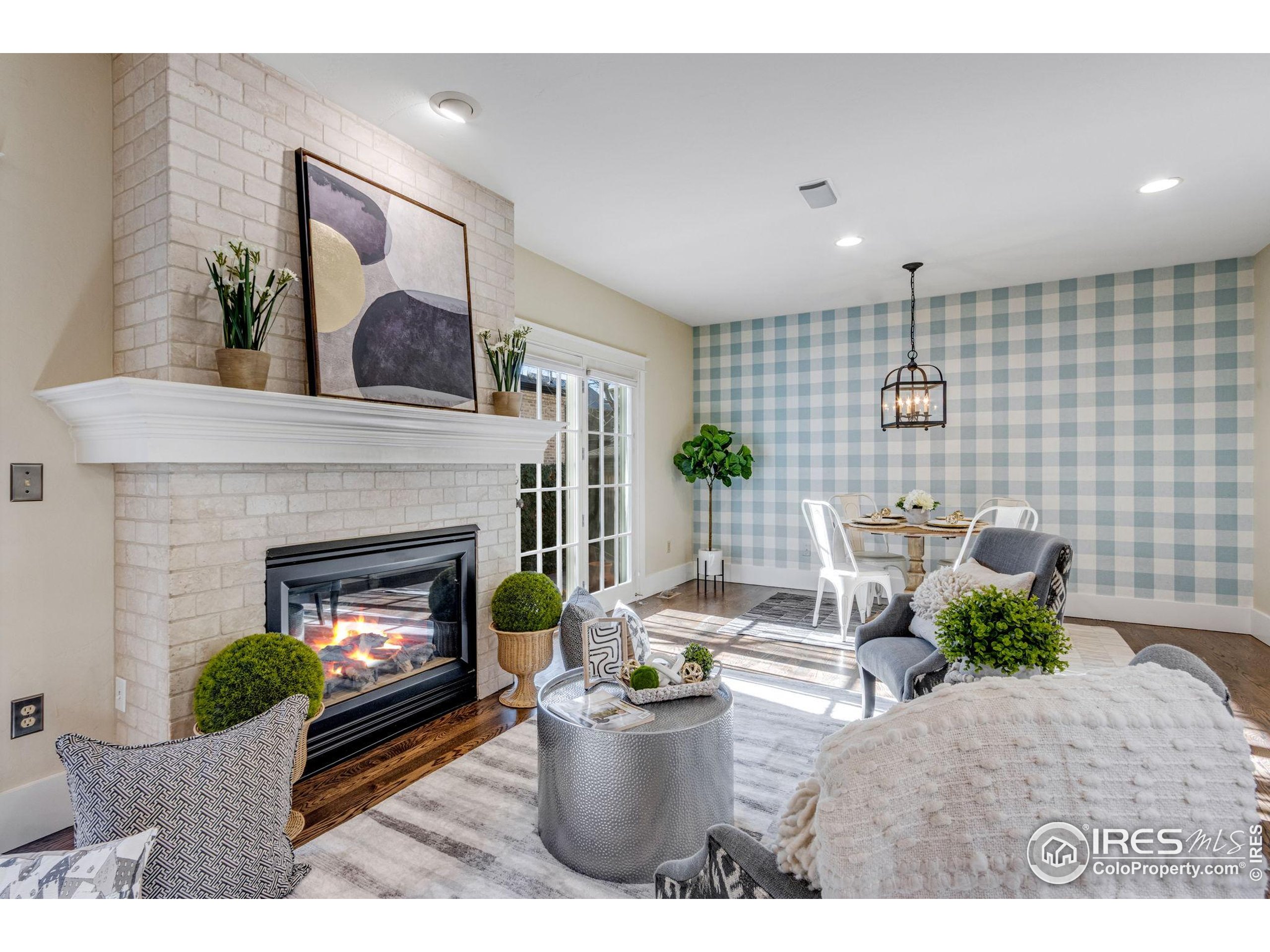 707 South Fillmore Street Denver, CO 80209 - Photo 23 of 49 a living room with furniture and a fireplace