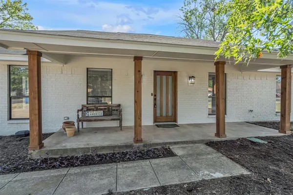 a view of a house with a patio