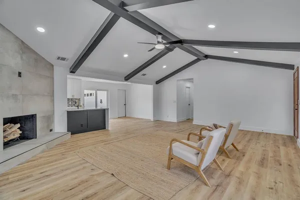a view of livingroom with furniture and fireplace