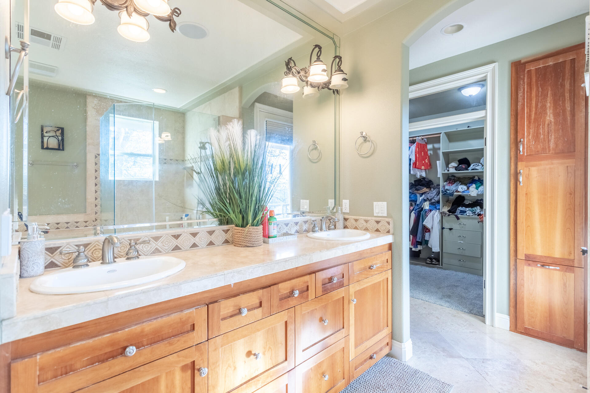 7775 Muletown Road Redding, CA 96001 - Photo 26 of 46 a bathroom with a sink double vanity and a mirror