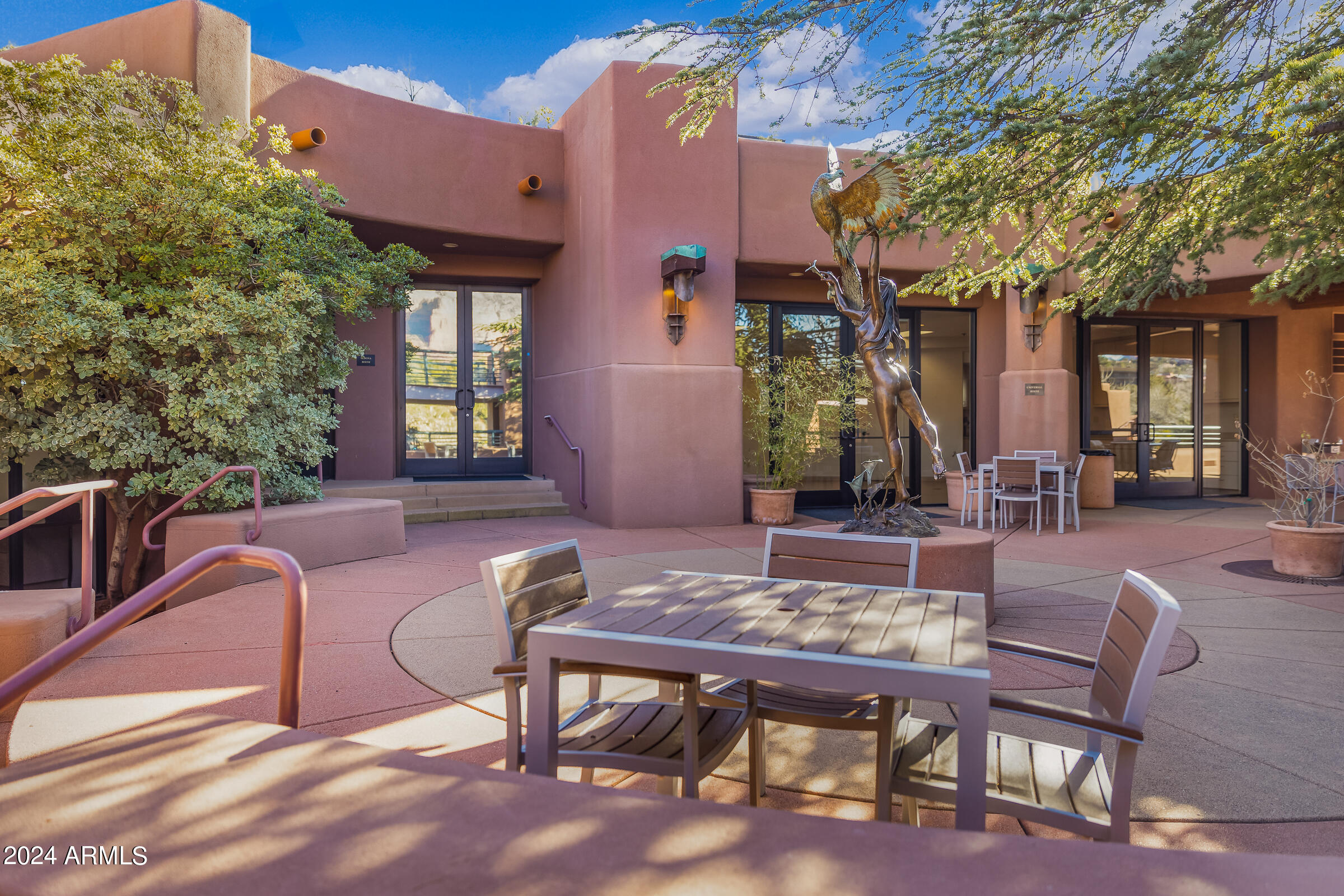 333 Schnebly Hill Road Sedona, AZ 86336 - Photo 14 of 69 a view of a patio with a table and chairs