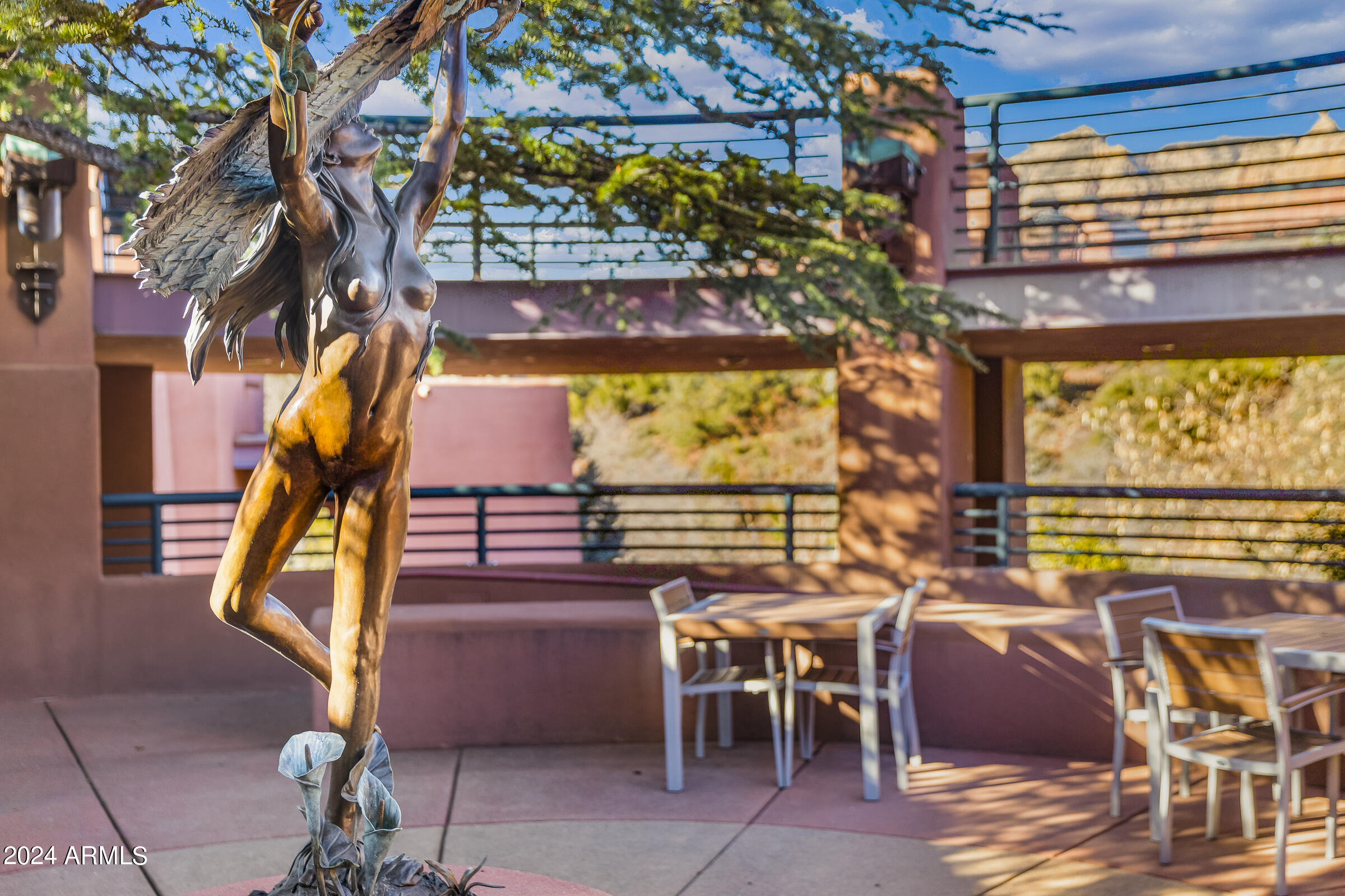 333 Schnebly Hill Road Sedona, AZ 86336 - Photo 16 of 69 a view of a patio with dining table and chairs
