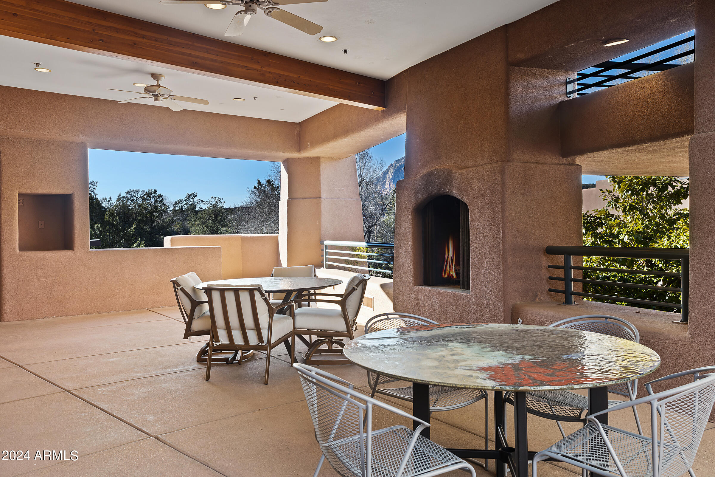 333 Schnebly Hill Road Sedona, AZ 86336 - Photo 17 of 69 a view of a dining table and chairs in the patio