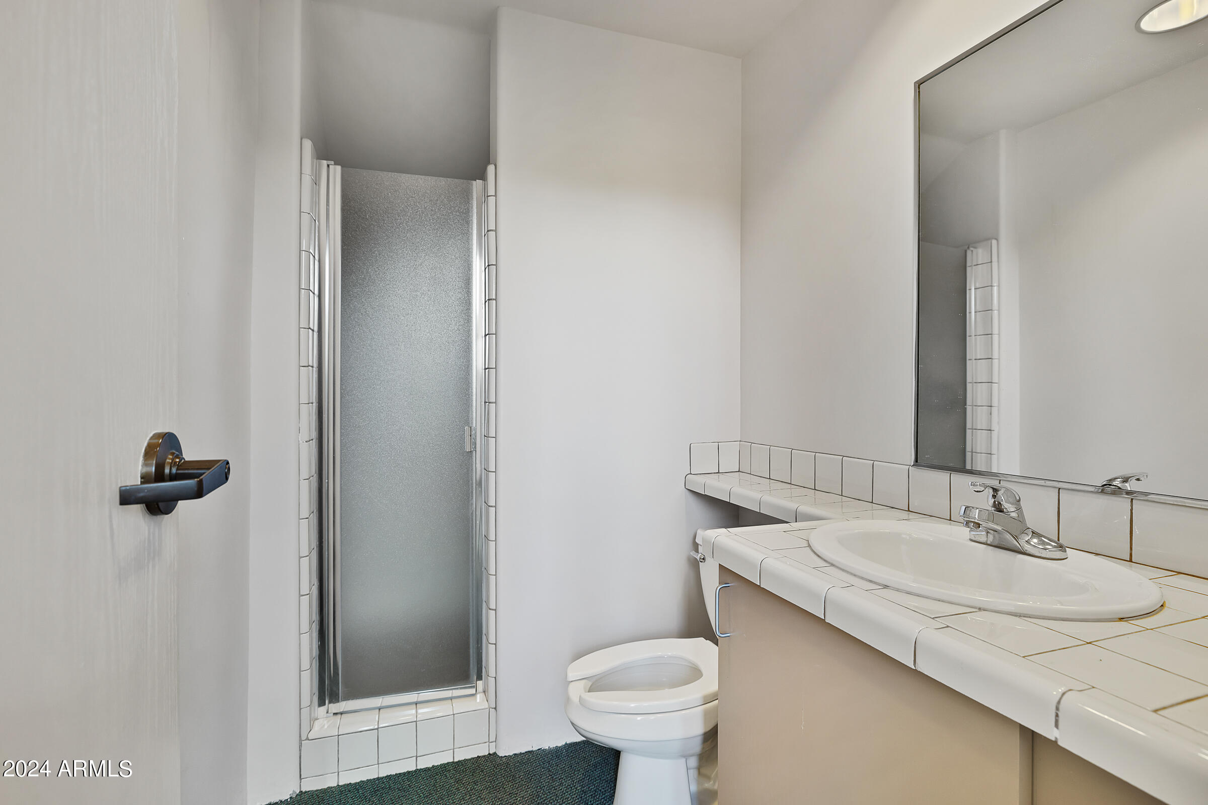 333 Schnebly Hill Road Sedona, AZ 86336 - Photo 19 of 69 a bathroom with a granite countertop sink toilet and shower