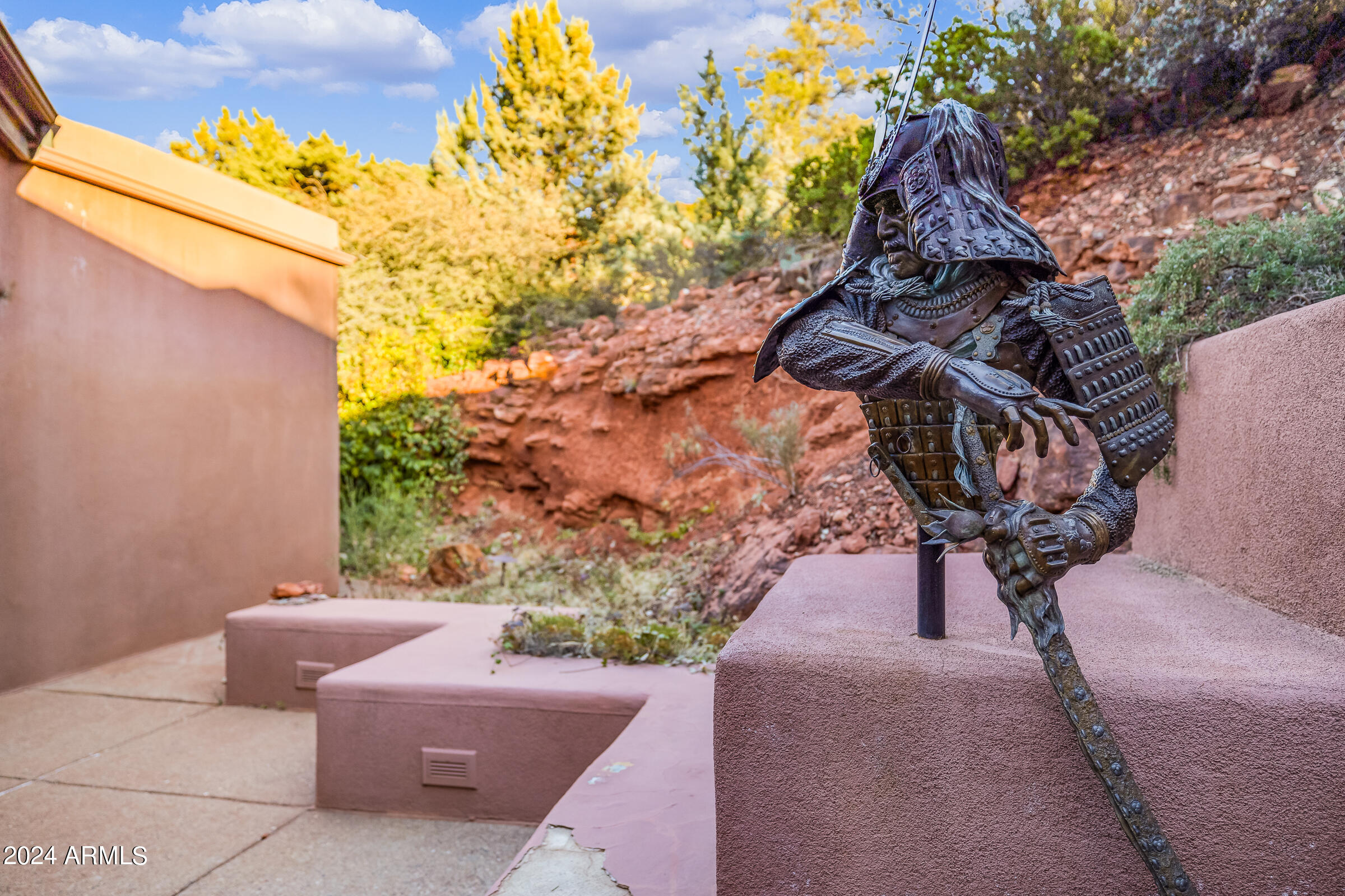333 Schnebly Hill Road Sedona, AZ 86336 - Photo 30 of 69 a backyard of a house with table and chairs