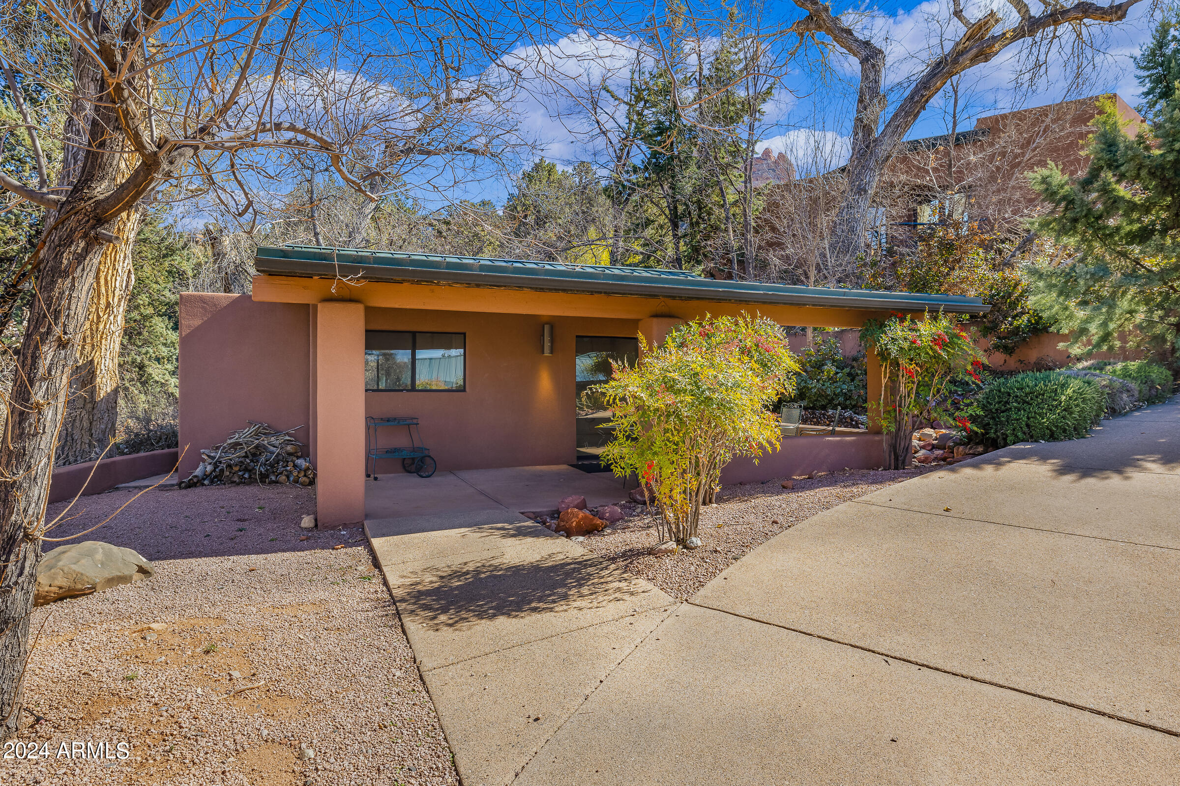 333 Schnebly Hill Road Sedona, AZ 86336 - Photo 48 of 69 a couple of potted plants in front of door