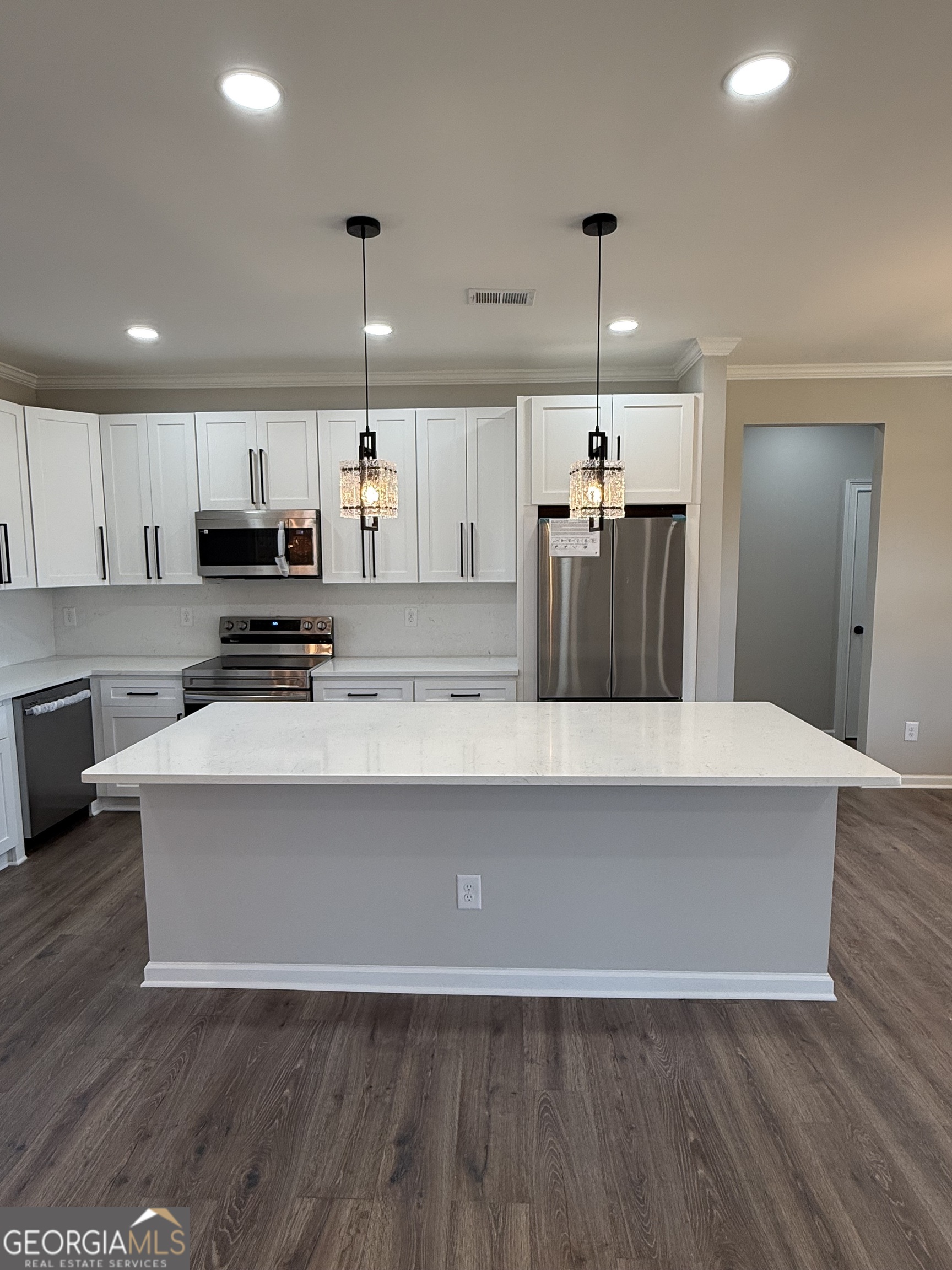 1205 Rocky Creek Road Hampton, GA 30228 - Photo 13 of 55 a view of kitchen with wooden floor