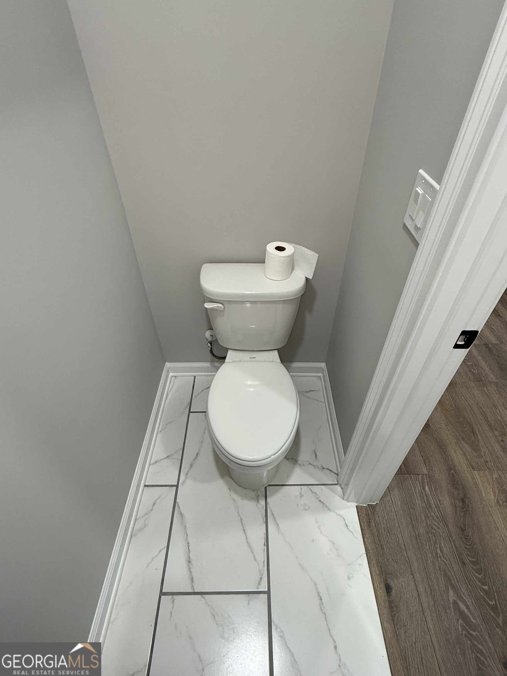 1205 Rocky Creek Road Hampton, GA 30228 - Photo 41 of 55 a bathroom with a toilet and a sink
